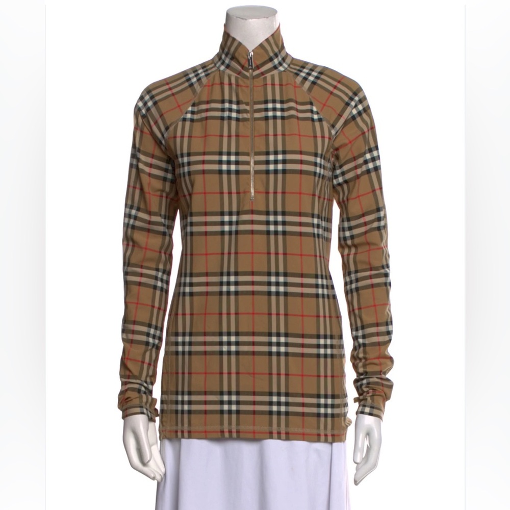 Burberry stretch jersey turtleneck top with a half-zip closure and thumb holes